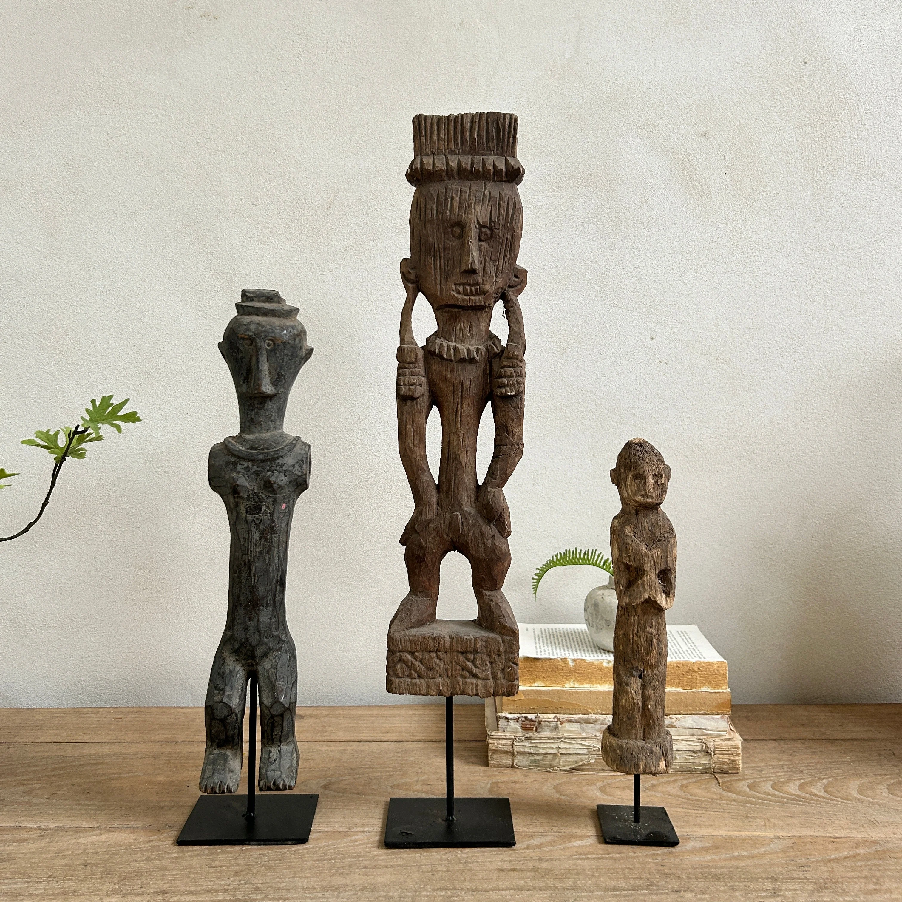 Antique hand-carved wooden statues on stand | Wira - Image 2