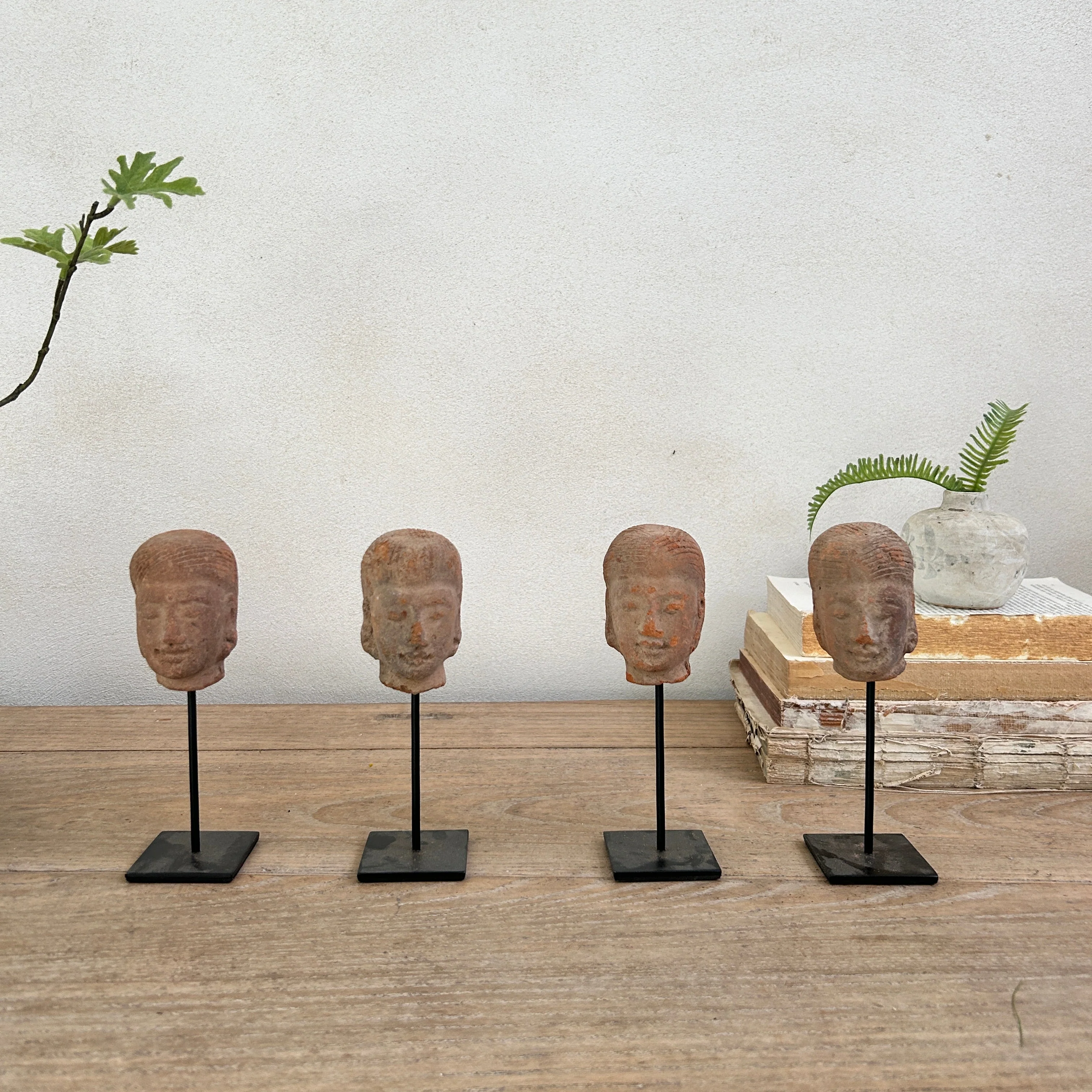 Hand-made antique terracotta heads on stand | Sita
